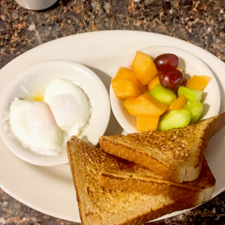 poached eggs with fruits and italian toast
